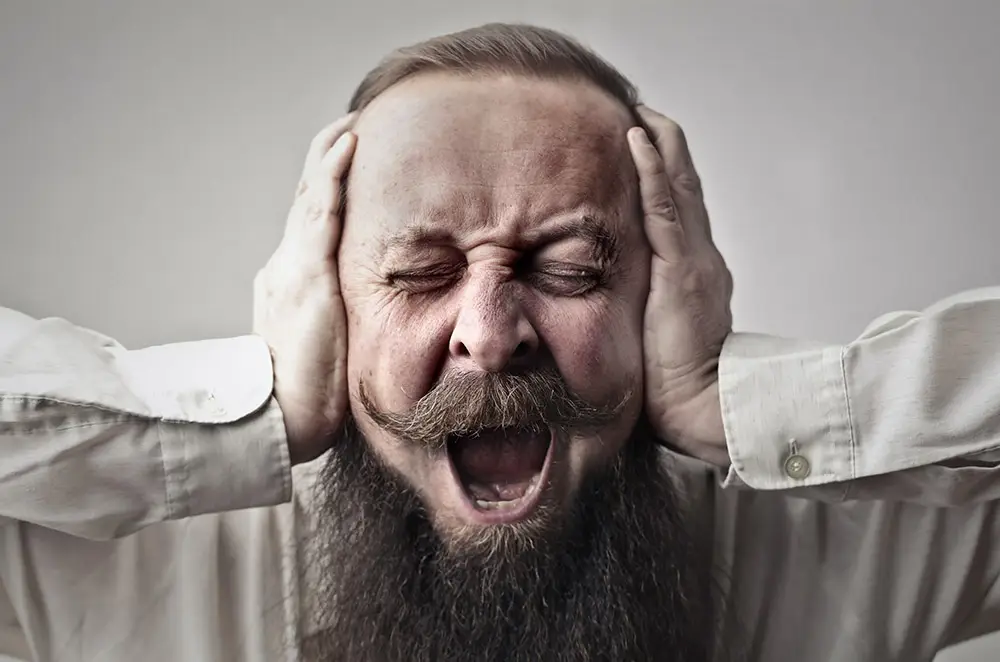 Earache: The guy holds his hands over his ears and screams