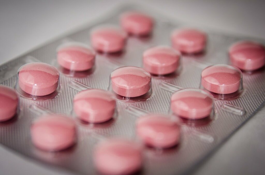 Różowe tabletki na ból