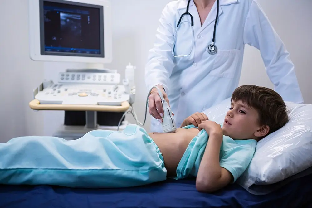 the boy has hepatitis, the doctor gives the boy an ultrasound
