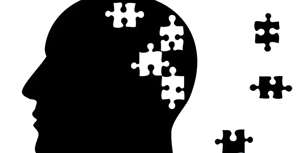 Alzheimer's and dementia: the figure of a person who has a broken puzzle as the brain