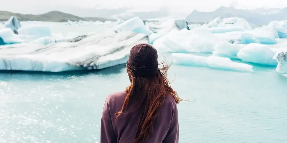 Ice swimming: The lady is standing by the lake